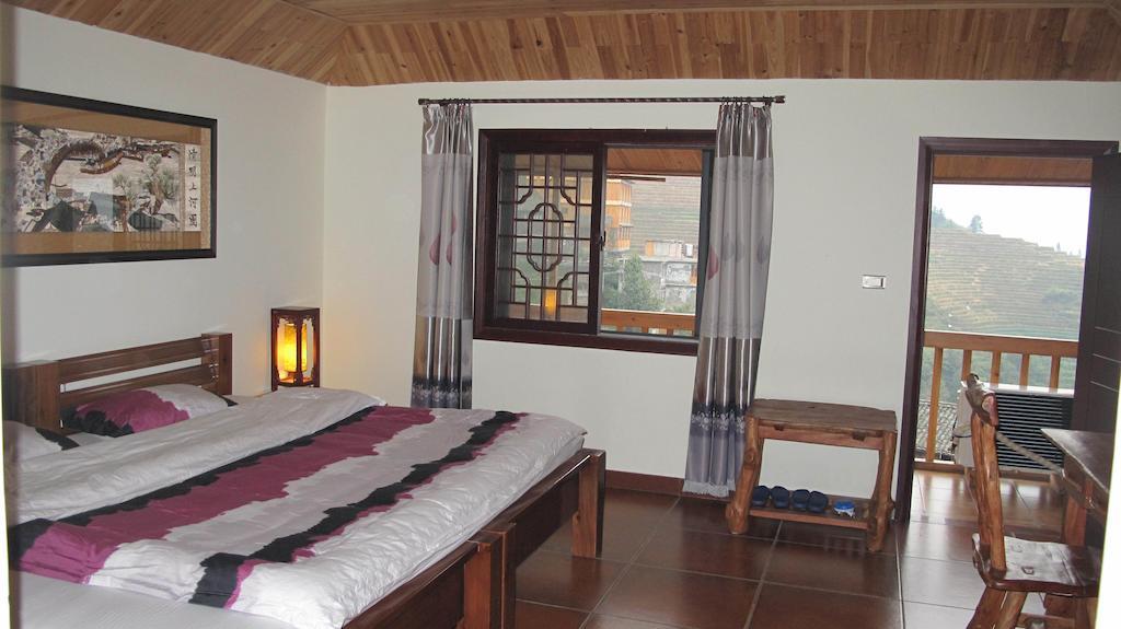 Longji Holiday Hotel Longsheng Chambre photo